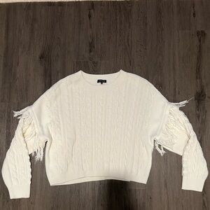 Cable knit sweater with fun fringe detail!